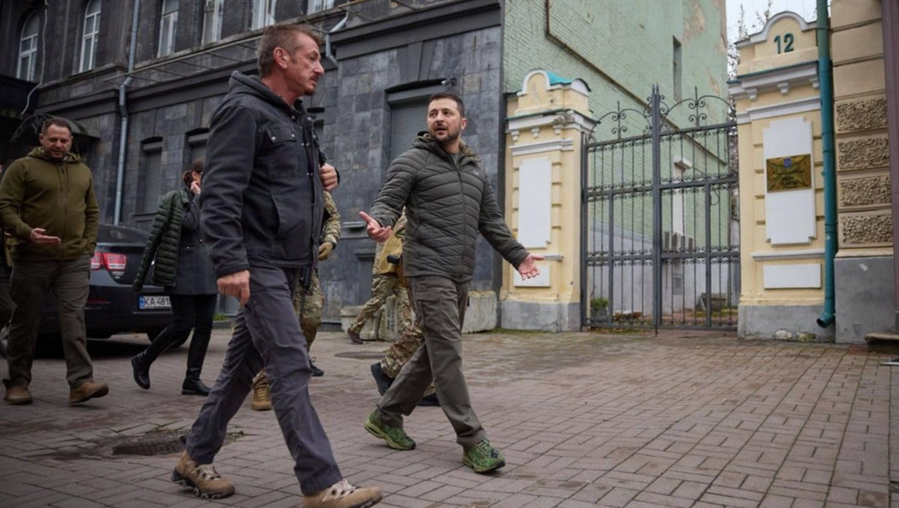 Sean Penn walks with Ukrainian President Volodymyr Zelenskyy during filming of 