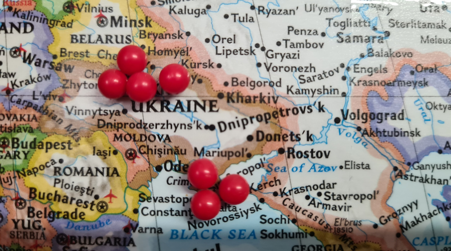 A map of Ukraine with pins clustered around Kyiv and Mariupol