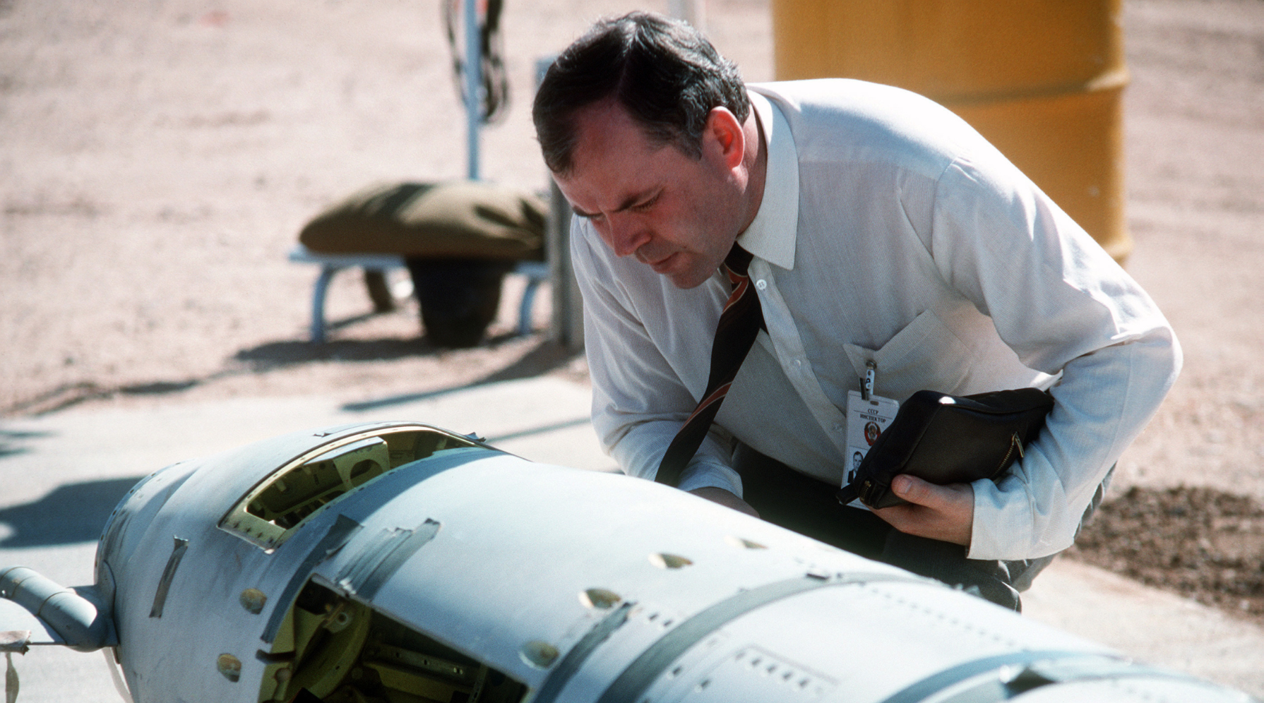 A Russian inspector examines an American BGM-109G Tomahawk ground launched cruise missile (GLCM) prior to its destruction.